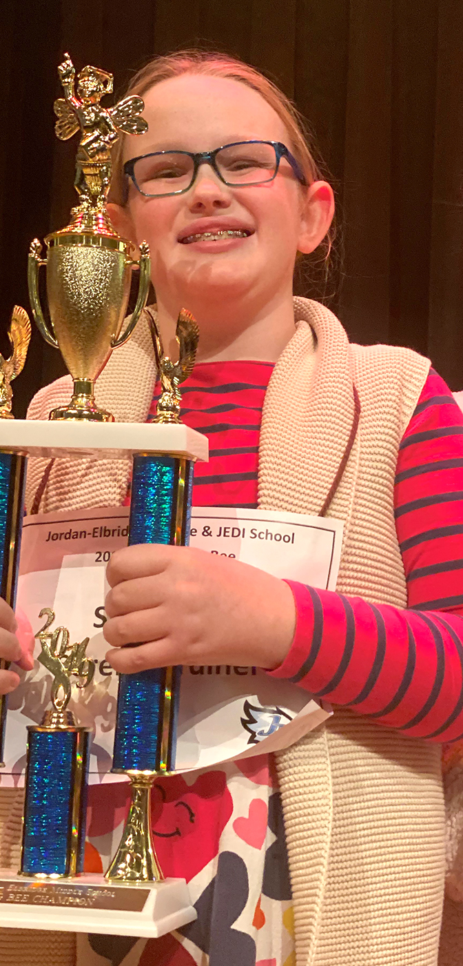 Seren Gardiner holds a trophy