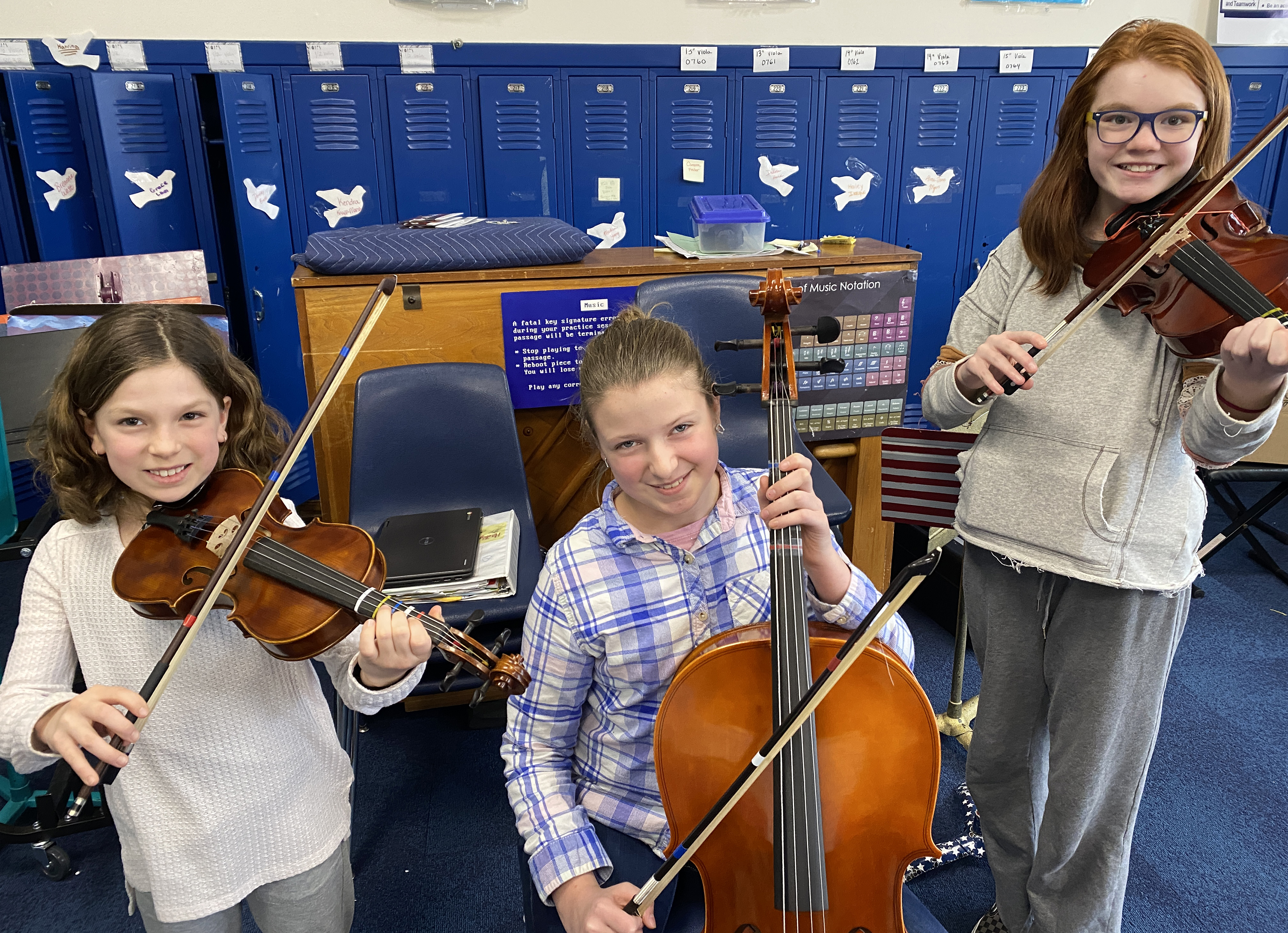 Picture of three student musicians 