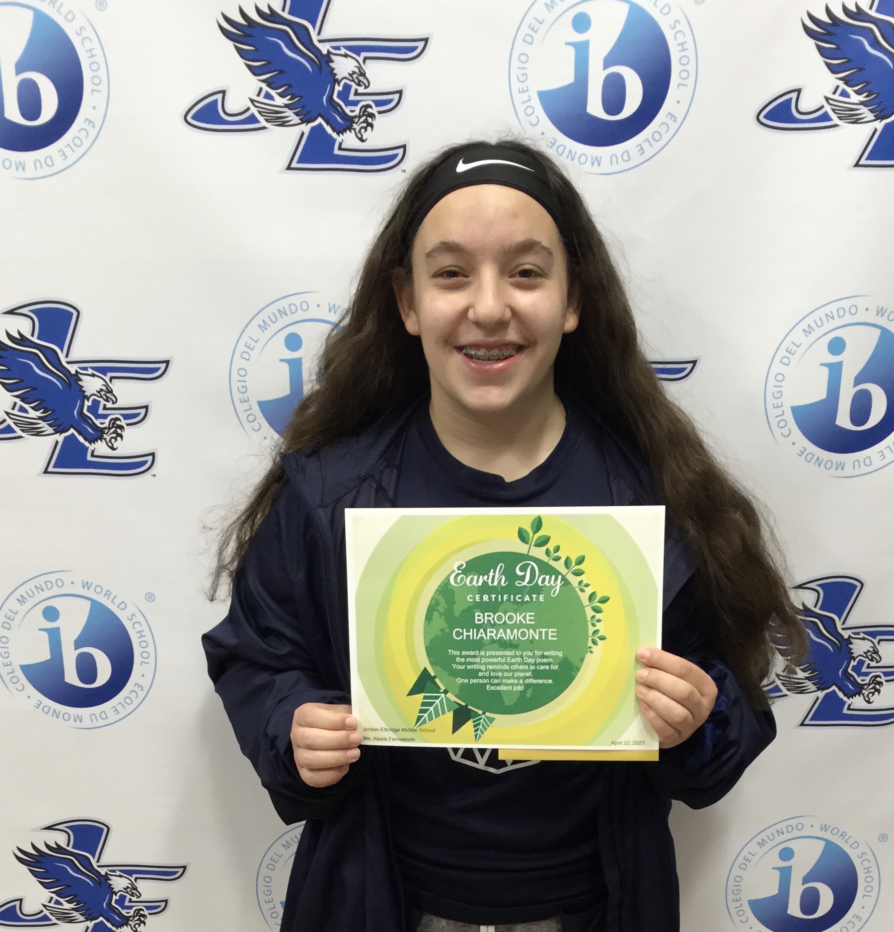 JEMS student Brook Chiaramonte is recognized for her Earth Day poem