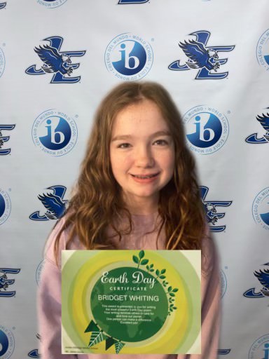 JEMS student Bridget Whiting is recognized for her Earth Day poem