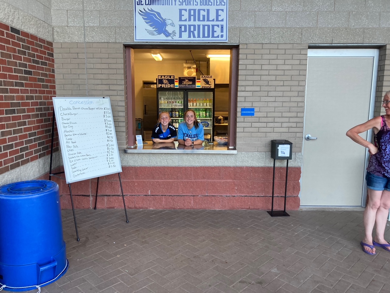Students work the concession stand during summer soccer league