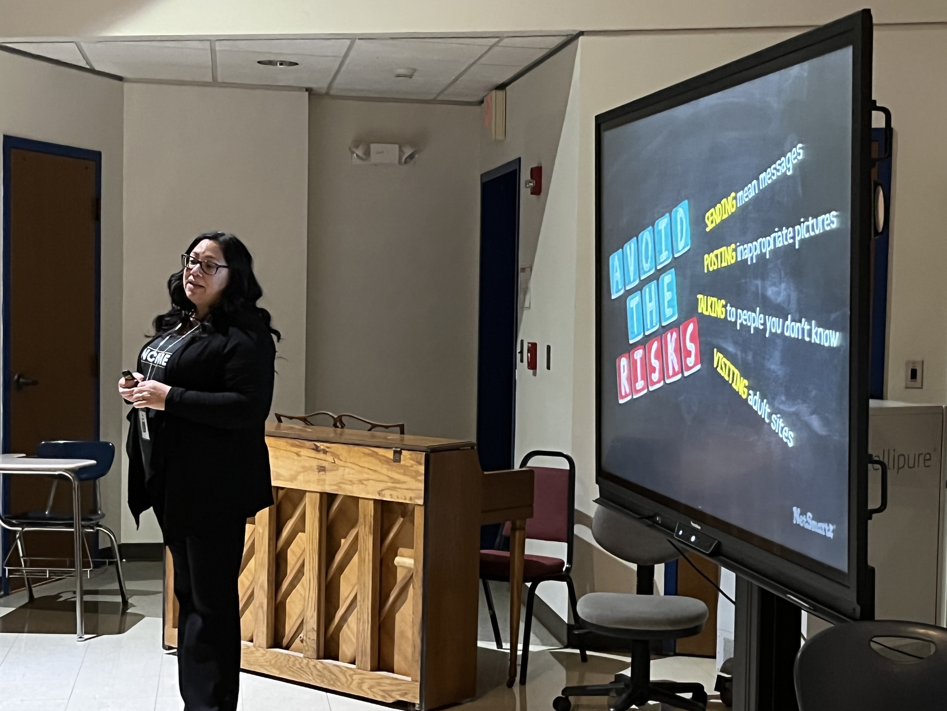 8th grade students attend an assembly on cyber safety run by the NCMEC