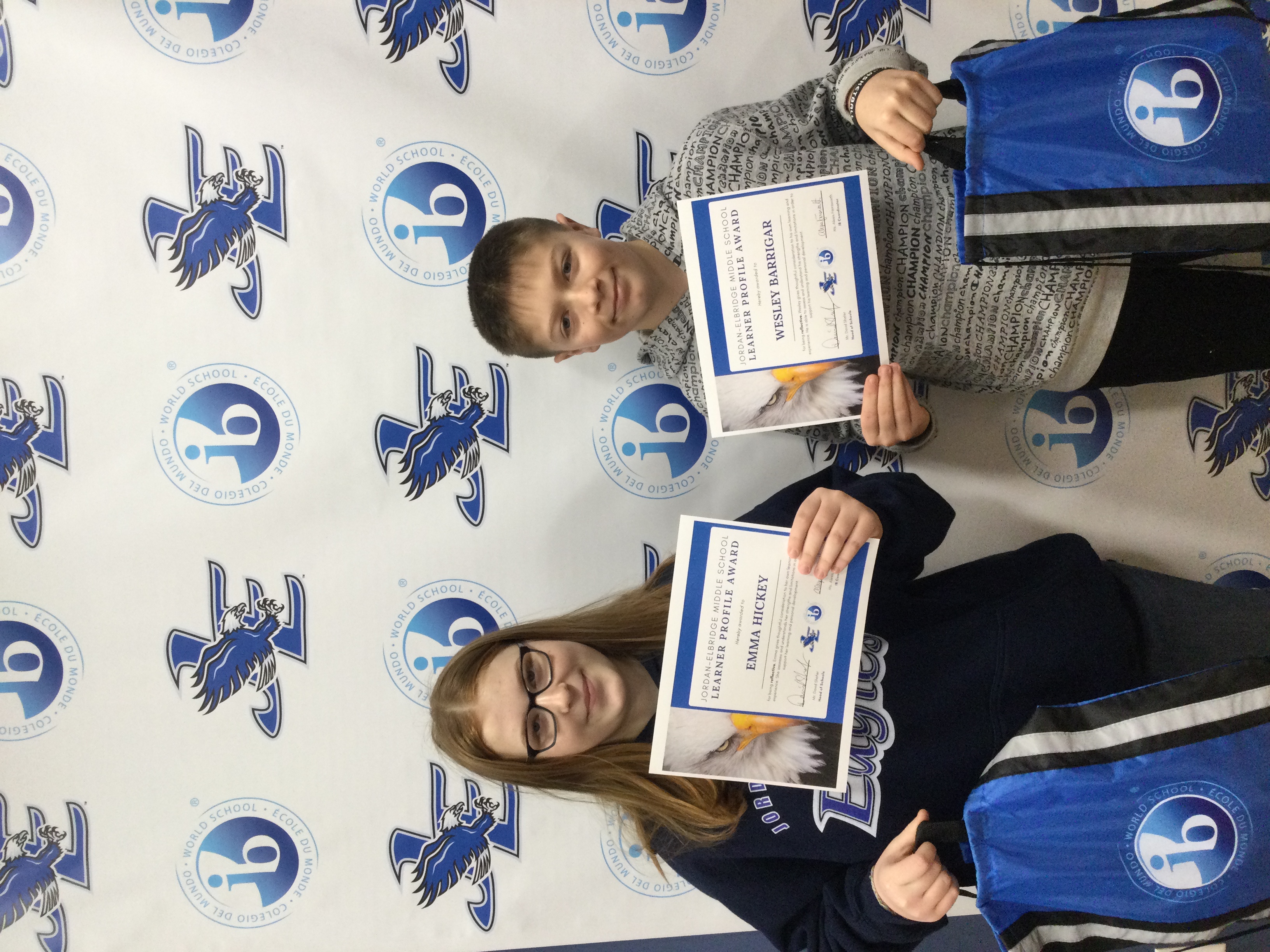 Wesley Barrigar and Emma Hickey pose for a photo after receiving the learner profile award for reflective in January.
