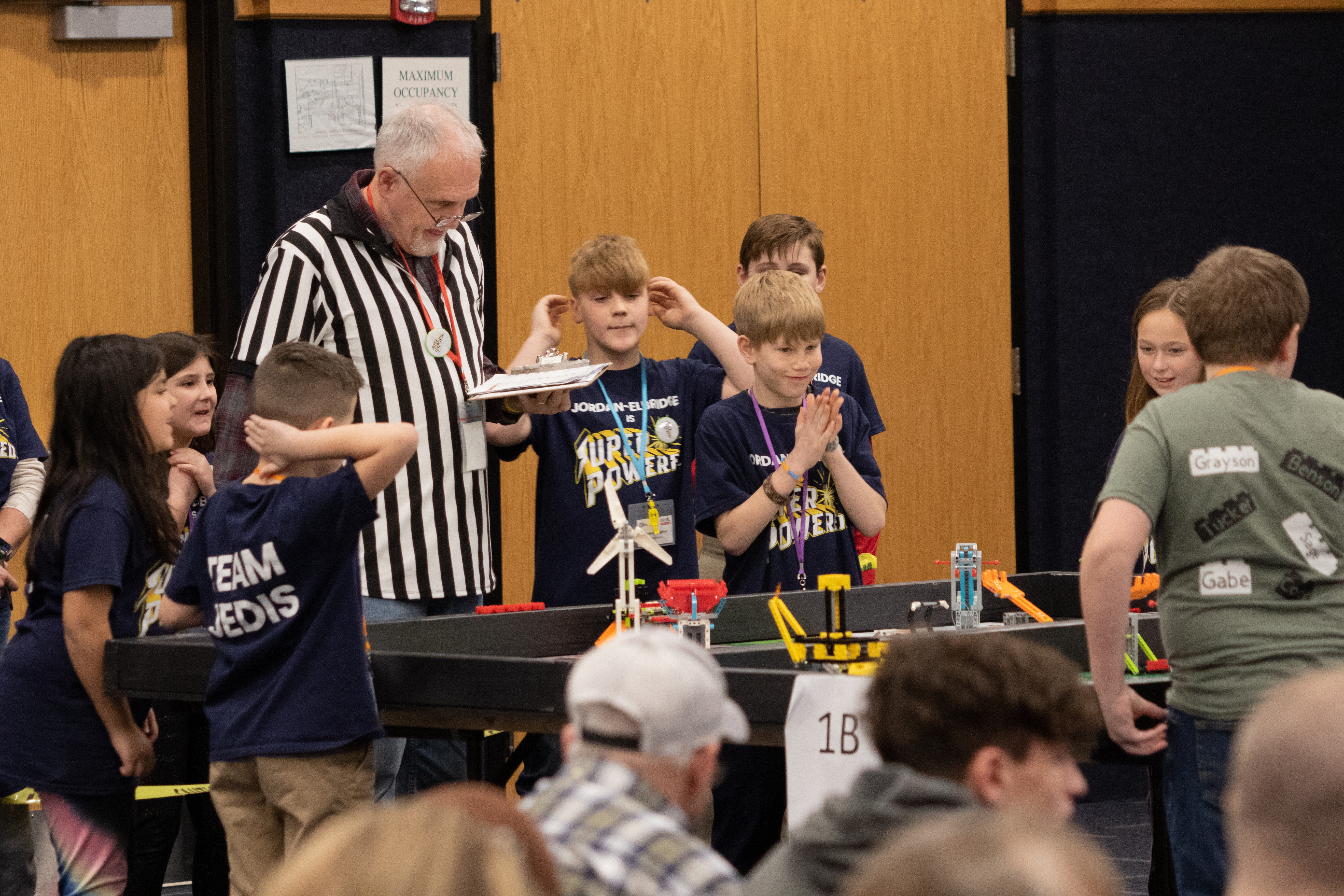JEDIS students receive "Rising All-Star" Award at recent FIRST Lego League competition.
