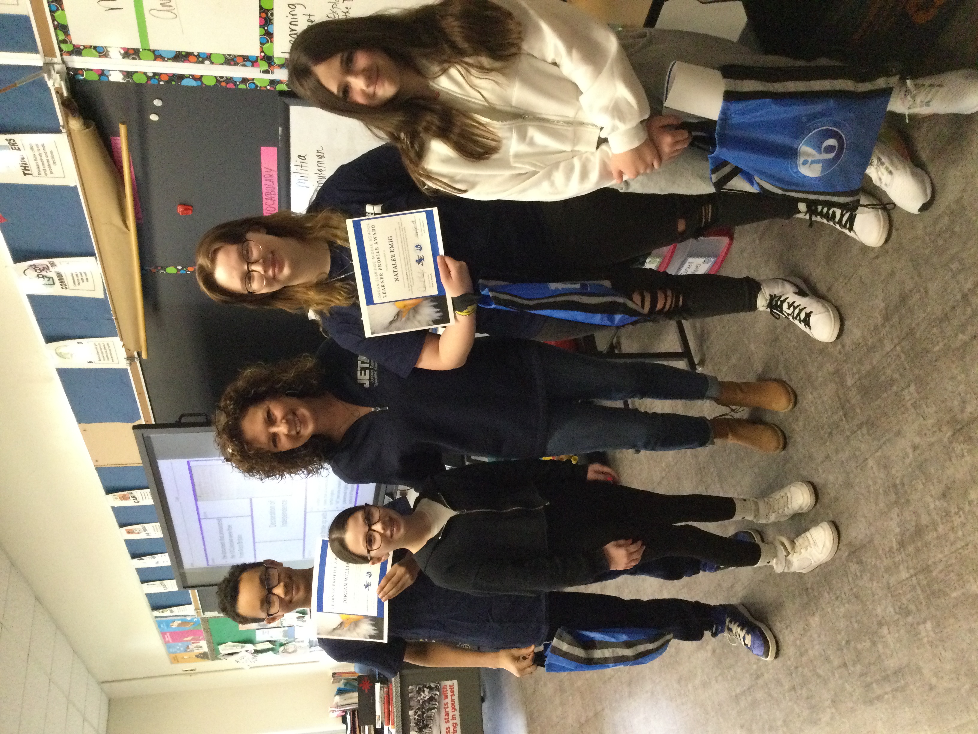 JEMS students pose for a photo with their teacher, Mrs. Giannettino.